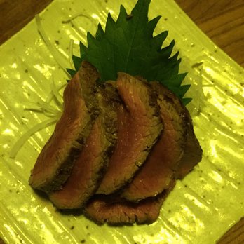 Ippuku - Med-rare steak with raw garlic - Bars Near Me - Berkeley, California