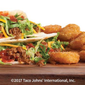 Taco John's - a pile of tacos and tater tots - Mexican Near Me - Sheridan, Wyoming Taco John's - a pile of tacos and tater tots - Mexican Near Me - Sheridan, Wyoming
