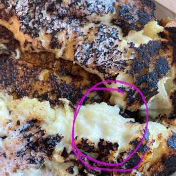 Local's Cafe - French Toast burnt on the outside, not cooked on inside- this was after sending the first one back which was the same way - Cafes Near Me - Port Jefferson, New York