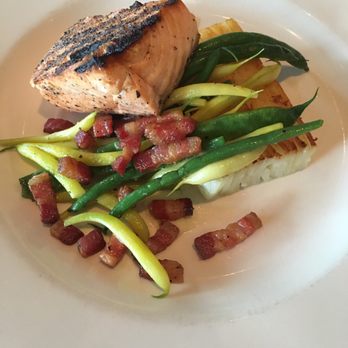 Roots Restaurant and Bar - Grilled salmon, green beans, potato gratin and bacon bits - New American Near Me - Camas, Washington Roots Restaurant and Bar - Grilled salmon, green beans, potato gratin and bacon bits - New American Near Me - Camas, Washington