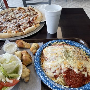 Milano’s Pizza - Eggplant Parmigiana pasta. Side salad and garlic knots. With BBQ chicken pizza. - Italian Near Me - Humboldt, Tennessee Milano’s Pizza - Eggplant Parmigiana pasta. Side salad and garlic knots. With BBQ chicken pizza. - Italian Near Me - Humboldt, Tennessee