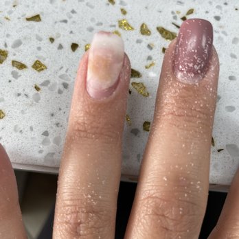 Euro Nails & Spa - Fungus formed on the acrylic and all 10 nails lifted. - Nail Salons Near Me - Kissimmee, Florida