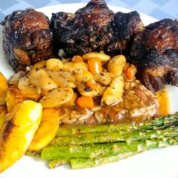 Concierge Cuisine - Caribbean Oxtails with Rice & Peas.