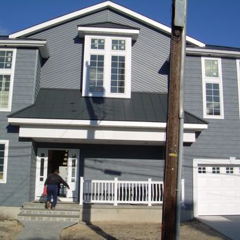 Saviors Custom Carpentry - a gray house with white trim - Carpenters Near Me - Hamilton, New Jersey Saviors Custom Carpentry - a gray house with white trim - Carpenters Near Me - Hamilton, New Jersey