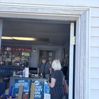 White's Exxon Service - Andy White talking to a customer he is the owner - Auto Repair Near Me - Washburn, Maine White's Exxon Service - Andy White talking to a customer he is the owner - Auto Repair Near Me - Washburn, Maine