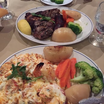 Pantheon Restaurant - Cheesy shrimp and in lamb chops in the back. - Greek Near Me - Toronto, Ontario