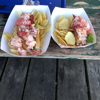 Five Islands Lobster - Big boy lobster roll next to regular - Seafood Near Me - Georgetown, Maine