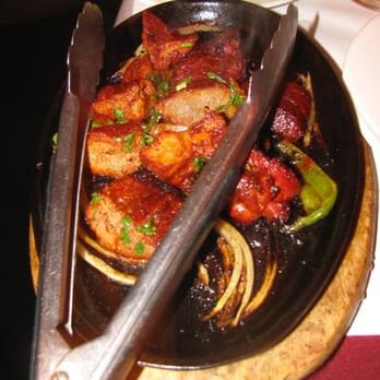 Polash - a plate of food on a table - Indian Near Me - New York, New York