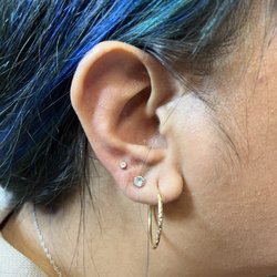 Flesh Skin Grafix Tattooing & Body Piercing - third lobe piercing done!