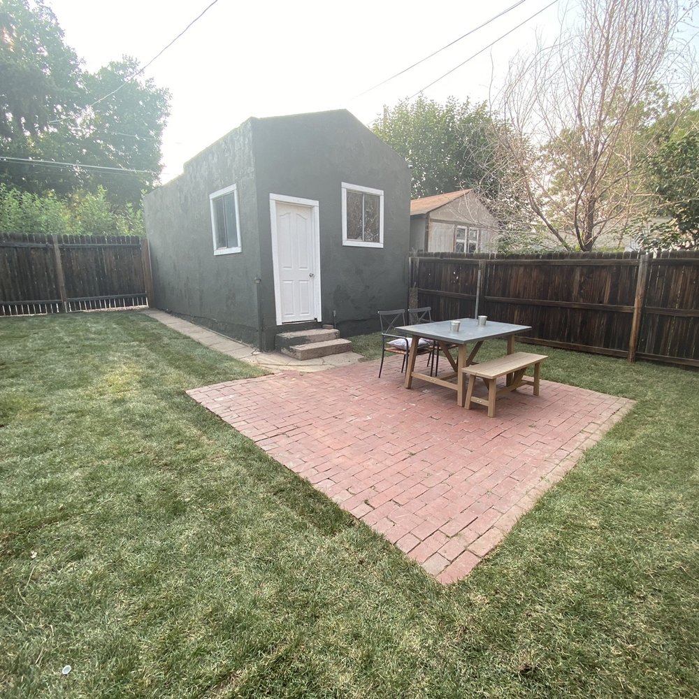 Jazmine's Landscaping and Tree Service - After--all gravel removed, some of the patio removed, random rock/stone gone, and sod laid down! All within a day. Amazing! - Landscaping Near Me Jazmine's Landscaping and Tree Service - After--all gravel removed, some of the patio removed, random rock/stone gone, and sod laid down! All within a day. Amazing! - Landscaping Near Me