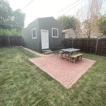 Jazmine's Landscaping and Tree Service - After--all gravel removed, some of the patio removed, random rock/stone gone, and sod laid down! All within a day. Amazing! - Landscaping Near Me Jazmine's Landscaping and Tree Service - After--all gravel removed, some of the patio removed, random rock/stone gone, and sod laid down! All within a day. Amazing! - Landscaping Near Me
