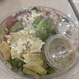 Small Greek salad with chicken $9.99 See the 2 dressings thank you It also came with a piece of sourdough bread Small Greek salad with chicken $9.99 See the 2 dressings thank you It also came with a piece of sourdough bread