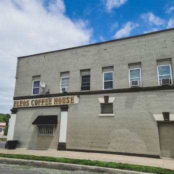 Eleos Coffee - a building with a sign that says eleos coffee house - American Near Me - Kansas City, Missouri