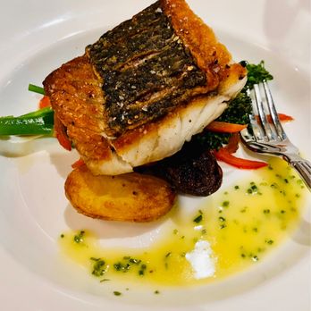 Chimney Park - Barramundi was perfectly cooked as were the bed of vegetables and fingerling potatoes - Specialty Food Near Me - Windsor, Colorado