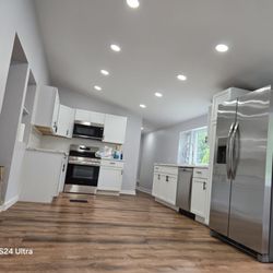 Elegance In Drywall - We just did a complete kitchen remodel with cabinets, vinyl flooring, drywall installation and wall painting.