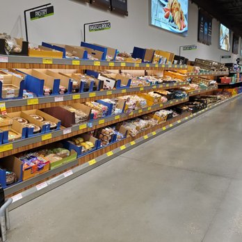ALDI - a grocery store aisle with shelves full of food - Grocery Near Me - Lewisville, Texas