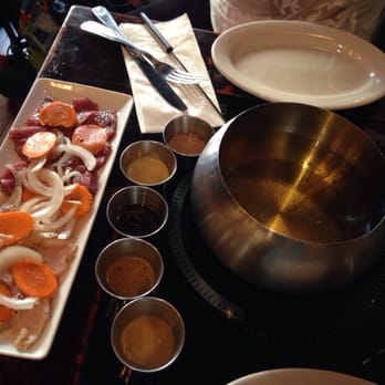 Taureau - We chose the canola oil instead of the broth. Our choice of meats are chicken and pork. Yummy! - Fondue Near Me - New York, New York Taureau - We chose the canola oil instead of the broth. Our choice of meats are chicken and pork. Yummy! - Fondue Near Me - New York, New York