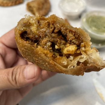 The Migrant Kitchen - Upper West Side - Sausage, egg and cheese empanada - Middle Eastern Near Me - New York, New York The Migrant Kitchen - Upper West Side - Sausage, egg and cheese empanada - Middle Eastern Near Me - New York, New York