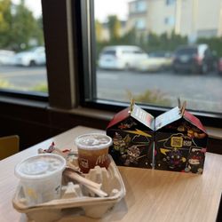 McDonald's - Hamburger Happy Meal & 4 pc. Chicken McNugget Happy Meal. Hello Kitty x Godzilla edition.