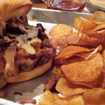 Woodchips BBQ - The Lightning burger with house made chips. With pulled pork, bacon, grilled onions, garlic aioli. Awesome! - Barbeque Near Me - Lapeer, Michigan Woodchips BBQ - The Lightning burger with house made chips. With pulled pork, bacon, grilled onions, garlic aioli. Awesome! - Barbeque Near Me - Lapeer, Michigan