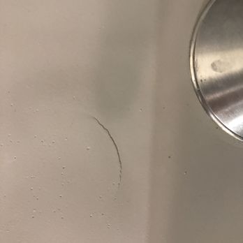 Advanced Bathtub - Crack on horizontal, non-loadbearing tub surface. - Refinishing Services Near Me