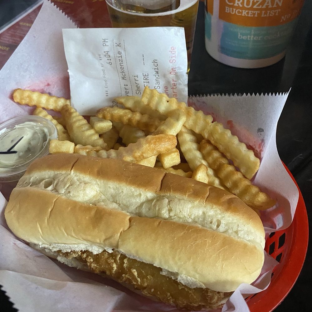 Kozzys - Fish Sandwich served with fries - Cocktail Bars Near Me - De Soto, Missouri Kozzys - Fish Sandwich served with fries - Cocktail Bars Near Me - De Soto, Missouri