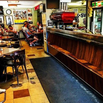 Cafe Gentile - people sitting at tables in a restaurant - Sandwiches Near Me - Montreal, Quebec