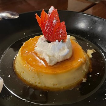 Aji Peruvian Cuisine - flan was delicious! shared between three people - Peruvian Near Me - Long Beach, California Aji Peruvian Cuisine - flan was delicious! shared between three people - Peruvian Near Me - Long Beach, California