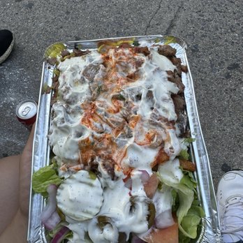 Mido’s Halal Food - Lamb Plate over Rice with White and some Red sauce - Food Trucks Near Me - New York, New York Mido’s Halal Food - Lamb Plate over Rice with White and some Red sauce - Food Trucks Near Me - New York, New York