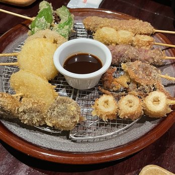 Koromo - Kushi Katsu Moriawase 10pc (short rib, negima, renkon, mushroom, maui onion, chikuwa, shishito, soft shell crab, arabiki sausage & mochi) - Japanese Near Me - Aiea, Hawaii Koromo - Kushi Katsu Moriawase 10pc (short rib, negima, renkon, mushroom, maui onion, chikuwa, shishito, soft shell crab, arabiki sausage & mochi) - Japanese Near Me - Aiea, Hawaii
