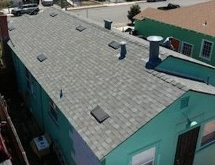 Slide of Mel's Roofing