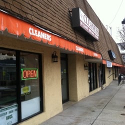 Ace Cleaners - Parking lot on side. And grab a beer at Tex Mex afterwards!