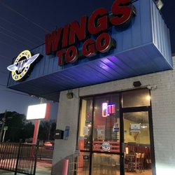 Wings To Go - Front at noght