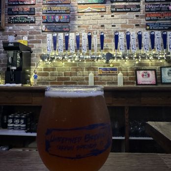 Unrefined Brewing - Gordalicious and the beers on tap 11/15/23 in the background - Breweries Near Me - Tarpon Springs, Florida Unrefined Brewing - Gordalicious and the beers on tap 11/15/23 in the background - Breweries Near Me - Tarpon Springs, Florida