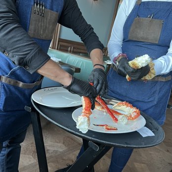 Klaw Miami - Table side service of breaking the crabs.  You almost feel sorry for them. - Steakhouses Near Me - Miami, Florida