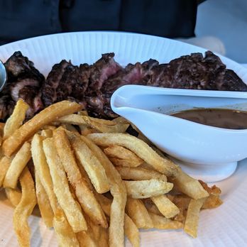 Obelix - Huge steak with frites. The fries that I snatched off the plate were yummy. - French Near Me - Chicago, Illinois