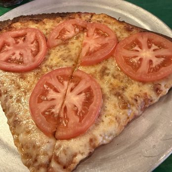 Oregano's - Slice with tomatoes - Pizza Near Me - Flagstaff, Arizona