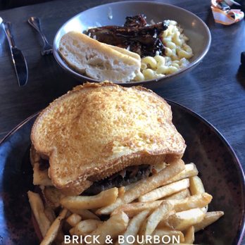 Brick & Bourbon - On the bottom is "The Next Day" burger, on the top is the "St Louis Rib" Mac and cheese. - New American Near Me - Maple Grove, Minnesota