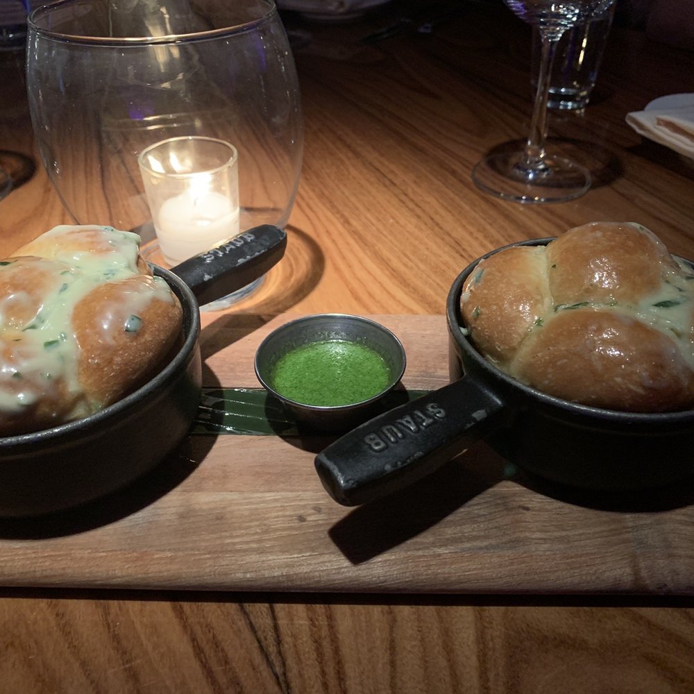 STK Steakhouse Toronto - Complimentary bread drizzled with blue cheese butter - Steakhouses Near Me - Toronto, Ontario STK Steakhouse Toronto - Complimentary bread drizzled with blue cheese butter - Steakhouses Near Me - Toronto, Ontario