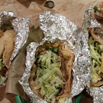 District Taco - Added lettuce toppings over Mexican style tacos - Mexican Near Me - Arlington, Virginia