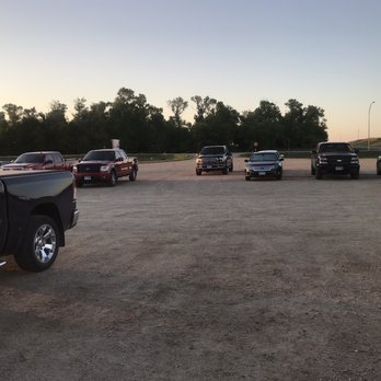 Brink's 104 - a parking lot full of trucks - Sports Bars Near Me - Sunburg, Minnesota