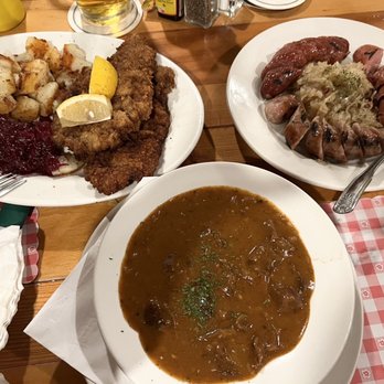 Laschet's Inn - Hot Sausage Plate with Sauerkraut. Goulash Soup Wiener Schnitzel with Roasted Potatoes and Red Cabbage. - German Near Me - Chicago, Illinois