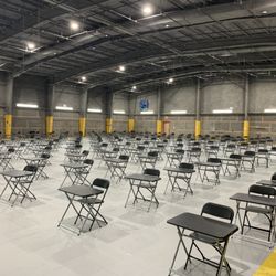 Personal tables and black folding chairs