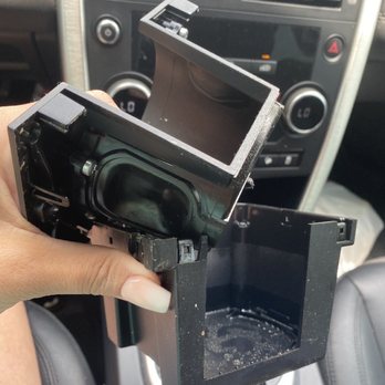 Caliber Collision - Destroyed my cup holder as soon as I lifted it just fell apart - Body Shops Near Me - Spring, Texas