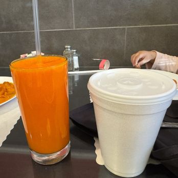Tandoor Indian Restaurant - The mango lassi was a deep orange but still tasted great! - Indian Near Me - Arlington, Texas