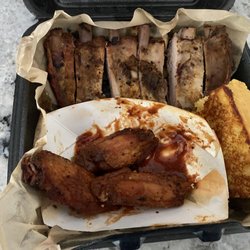 Moe's Original Bar B Que - Ribs had 0 flavor. Wings were good and cornbread was the best thing in the box.
