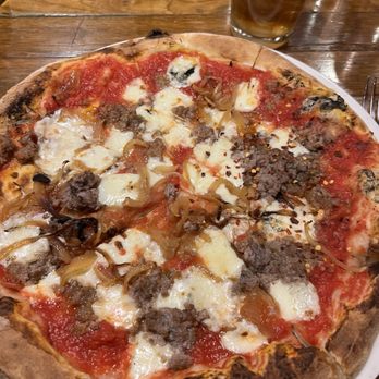 Fat Olives - Sausage pizza with caramelized onions, and housemaid mozzarella - Pizza Near Me - Flagstaff, Arizona