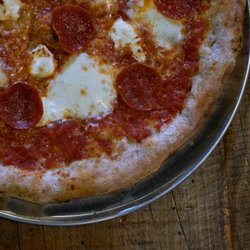 The Upper Crust - The Pepperoni with Upper Crust tomato sauce, ricotta cheese, fresh mozzarella cheese, parmesan cheese, and mild, smooth pepperoni