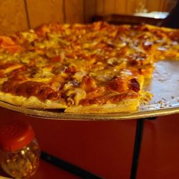 Large St. Louis style with bacon and mushrooms. Large St. Louis style with bacon and mushrooms.