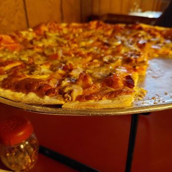 Serra's Pizzeria - Large St. Louis style with bacon and mushrooms. - Pizza Near Me - Maryland Heights, Missouri Serra's Pizzeria - Large St. Louis style with bacon and mushrooms. - Pizza Near Me - Maryland Heights, Missouri